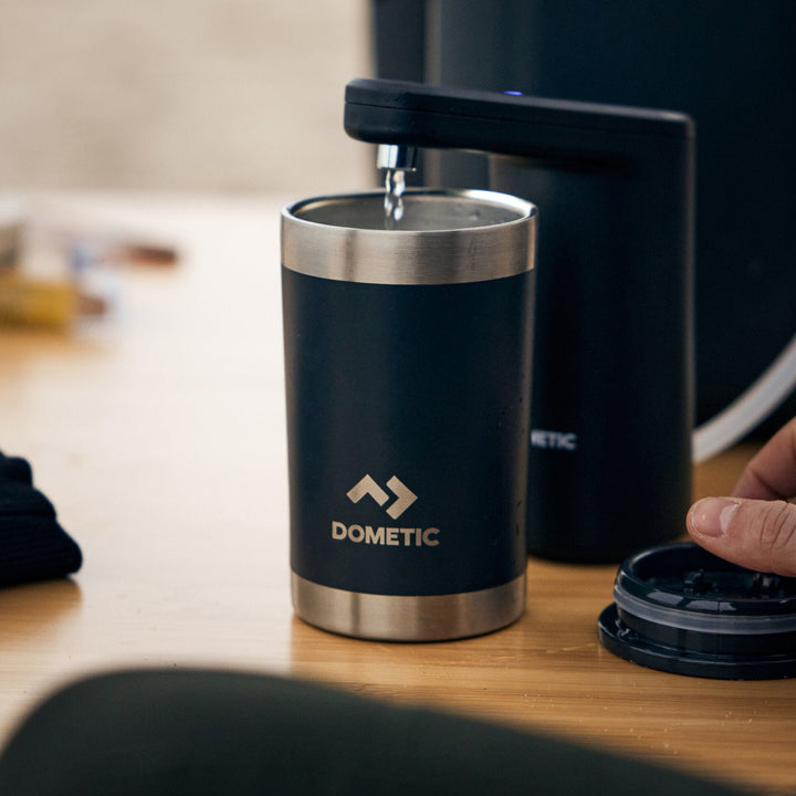 Dometic GO Hydration Water Faucet in use camping kitchen