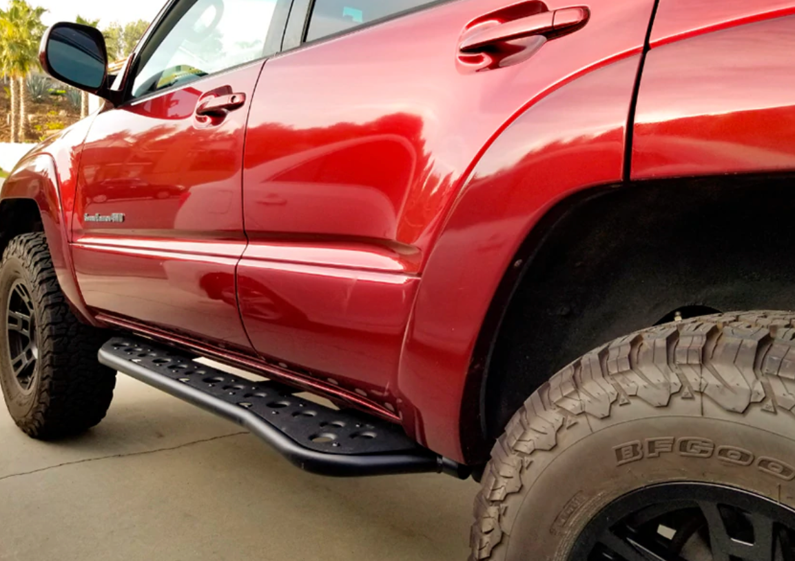 CALI RAISED LED 2010-2022 TOYOTA 4RUNNER STEP EDITION BOLT ON ROCK SLIDERS