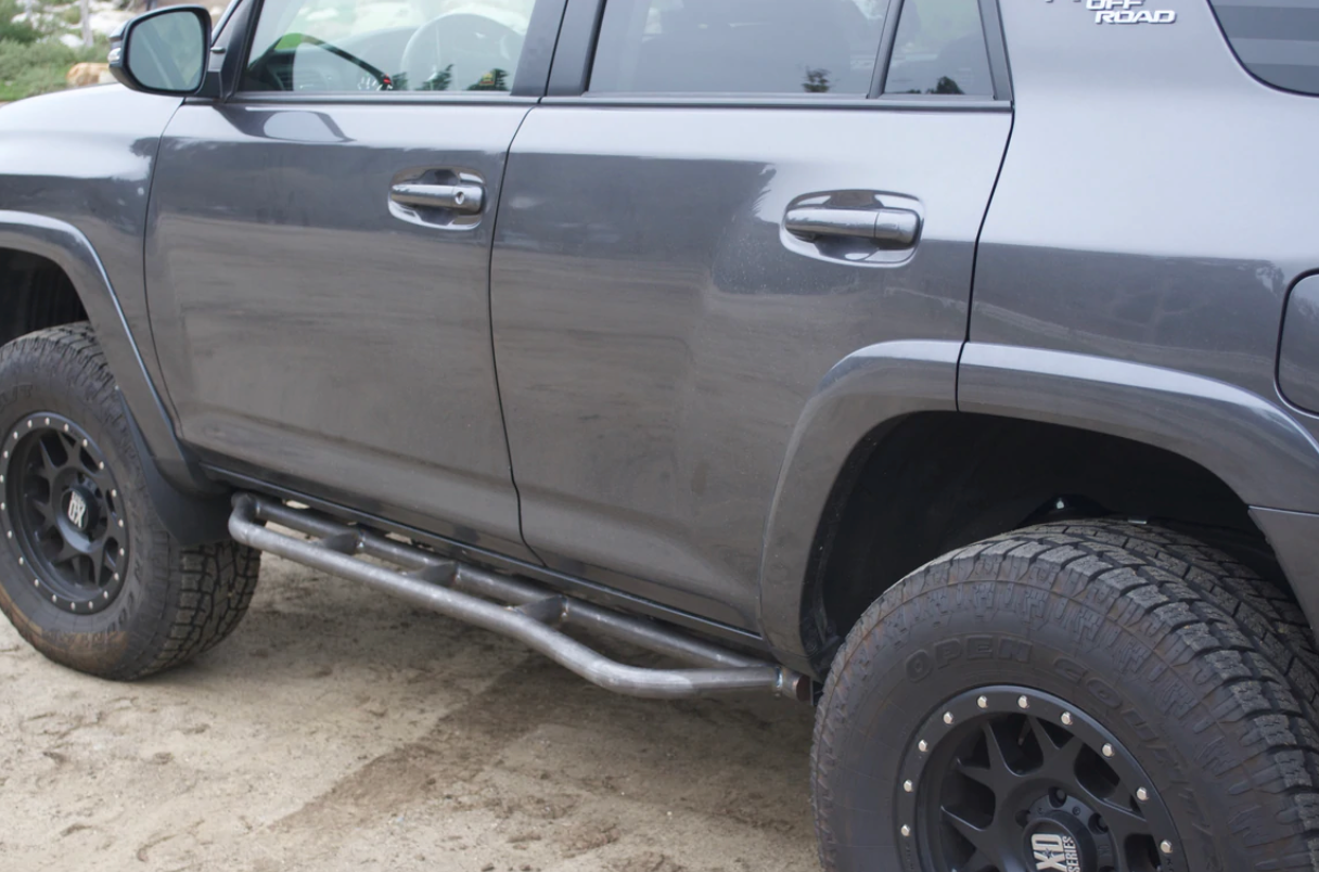 CALI RAISED LED 2010-2022 TOYOTA 4RUNNER STEP EDITION BOLT ON ROCK SLIDERS