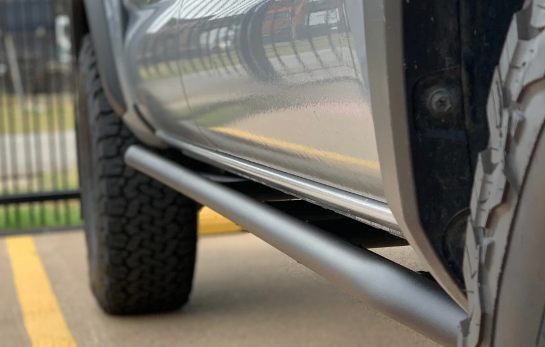 CALI RAISED LED 2005-2022 TOYOTA TACOMA TRAIL EDITION ROCK SLIDERS